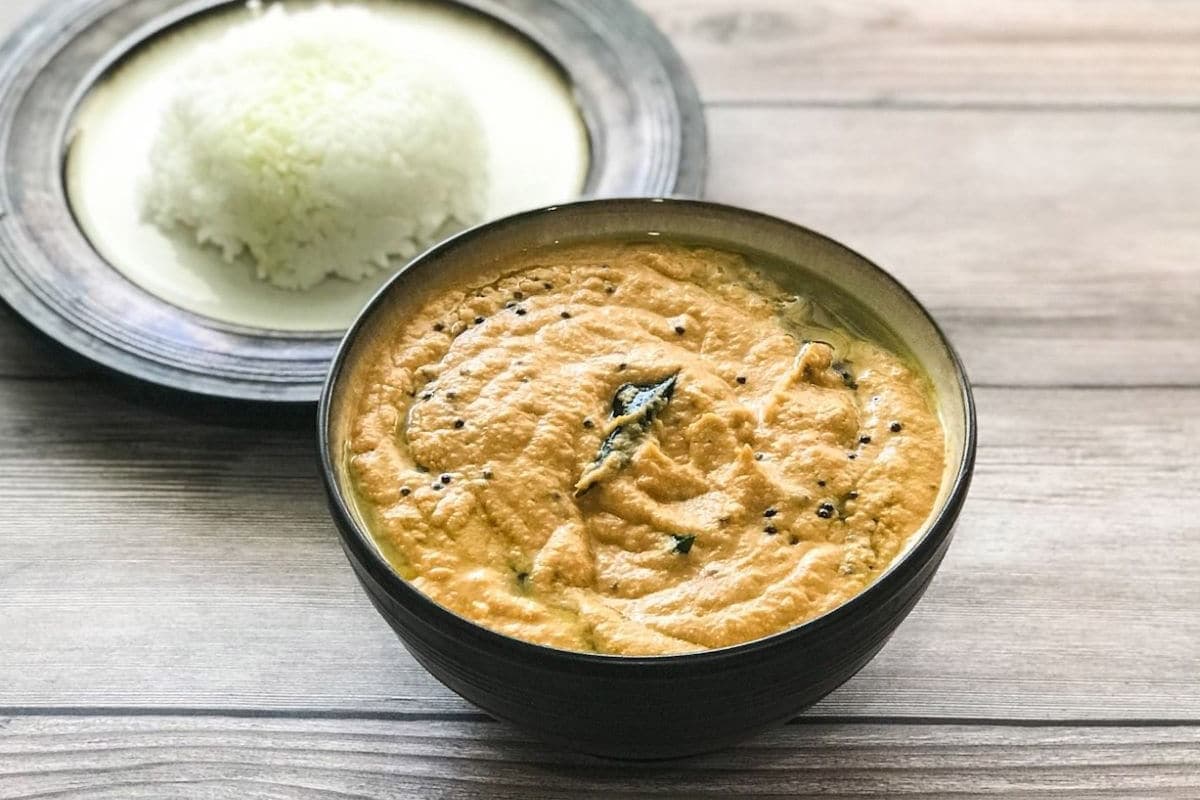 A bowl of cabbage chutney is on the table 