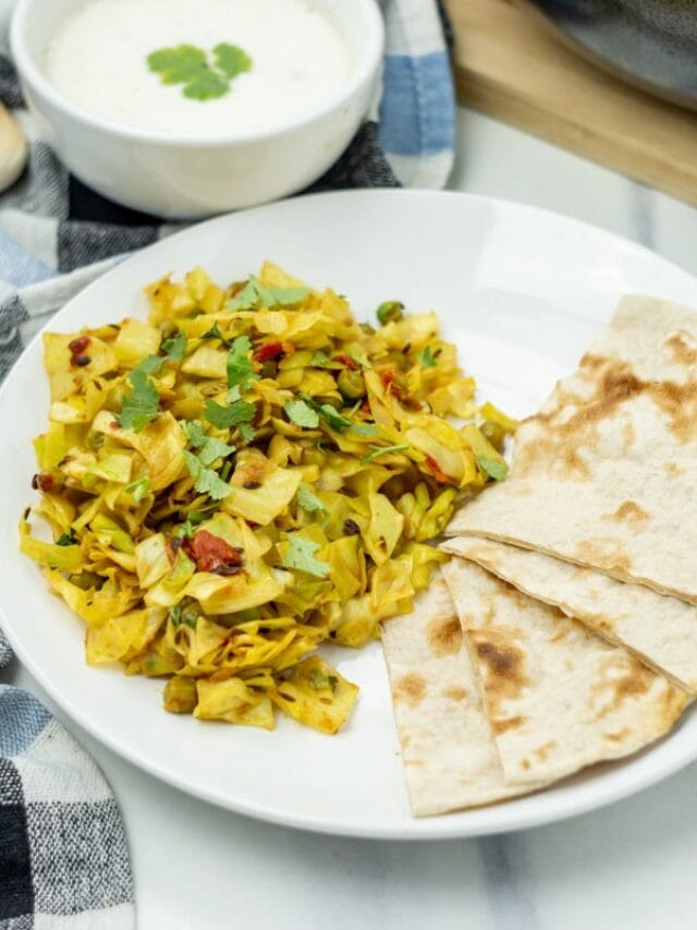 Indian cabbage stir fry with peas in a plate