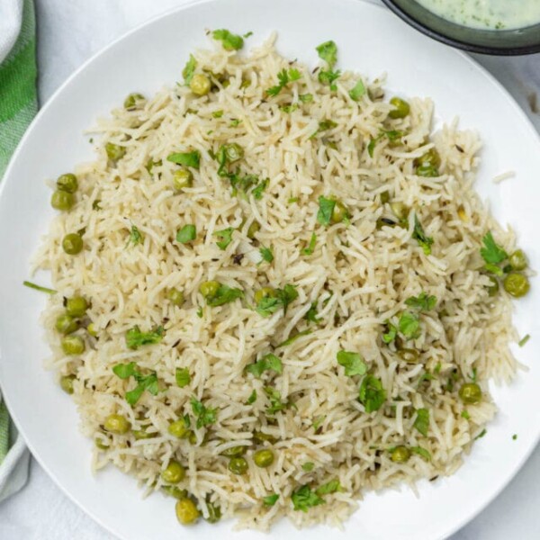 fluffy Peas Pulao in a round plate