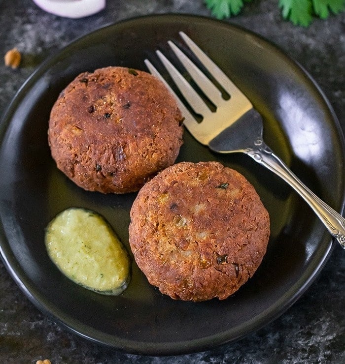 Kala chana kebab in black plate