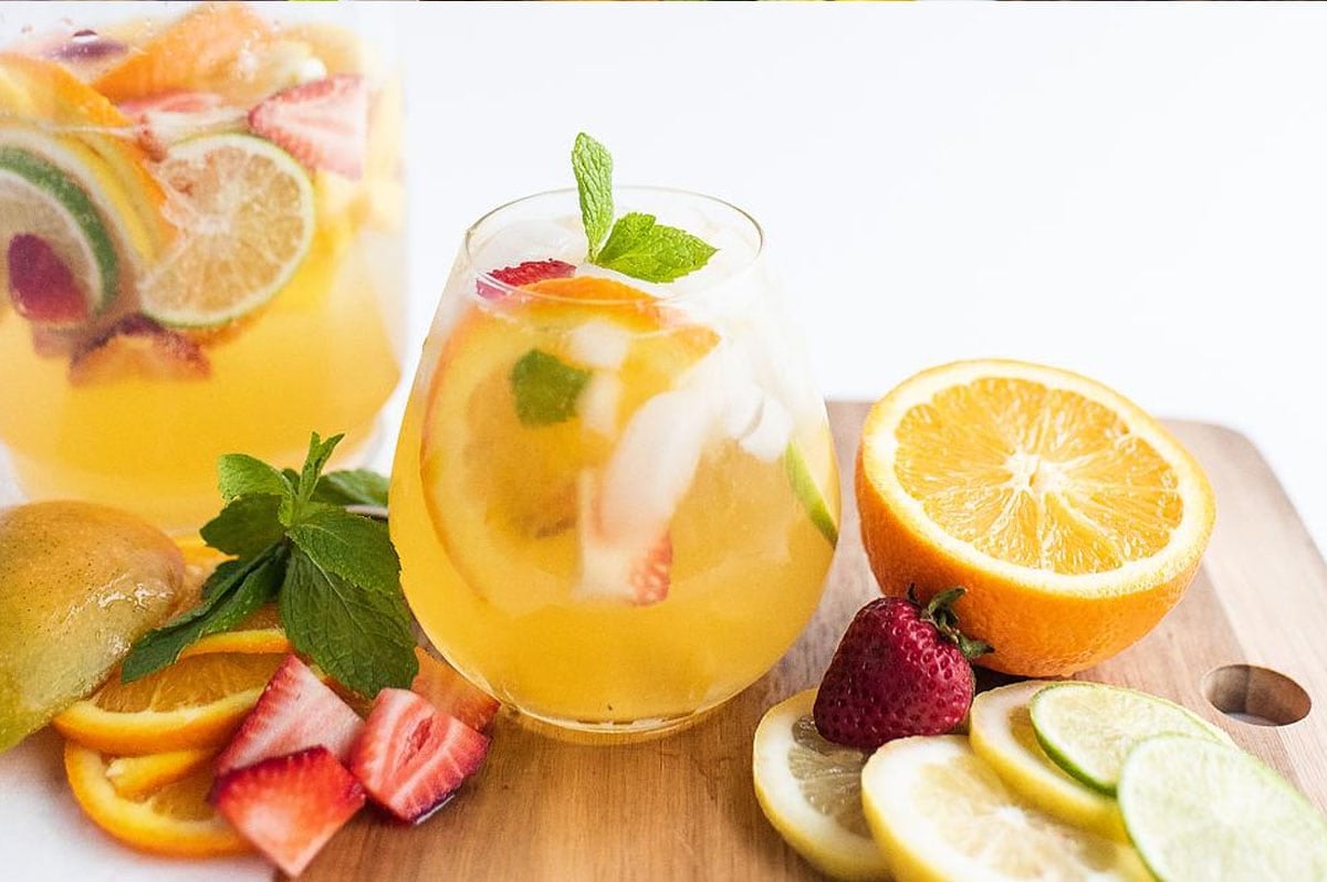 Mango Citrus Berry White Sangria in a glass