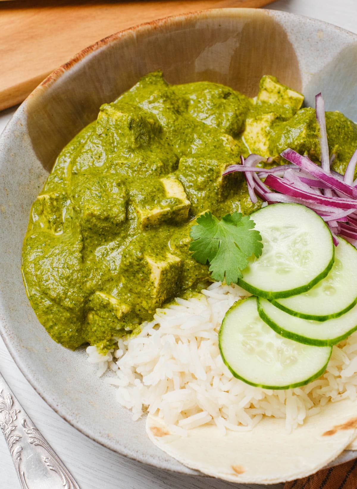 A healthy and flavorful Palak Tofu recipe with steamed rice