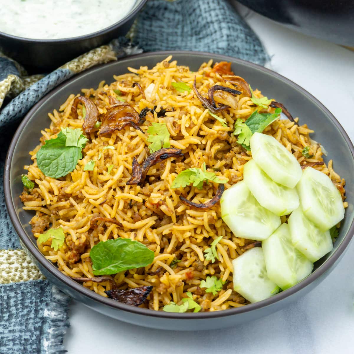 Keema Pulao in a black plate