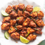 Colorful and flavorful Chicken 65 with vibrant spices.