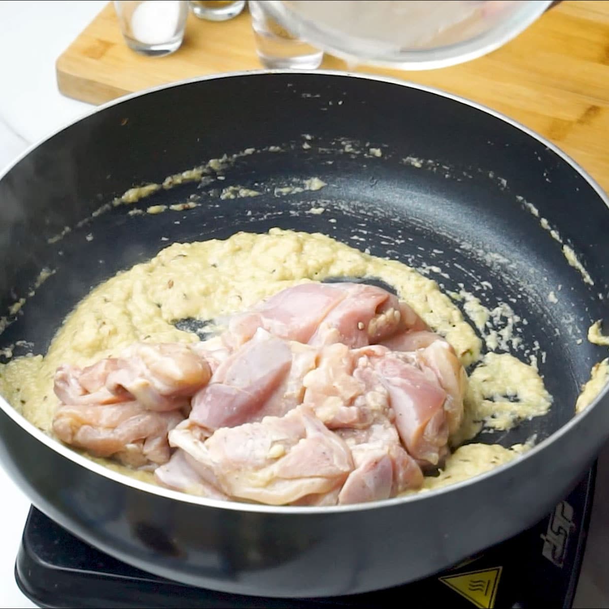 add Marinated Chicken to the pan