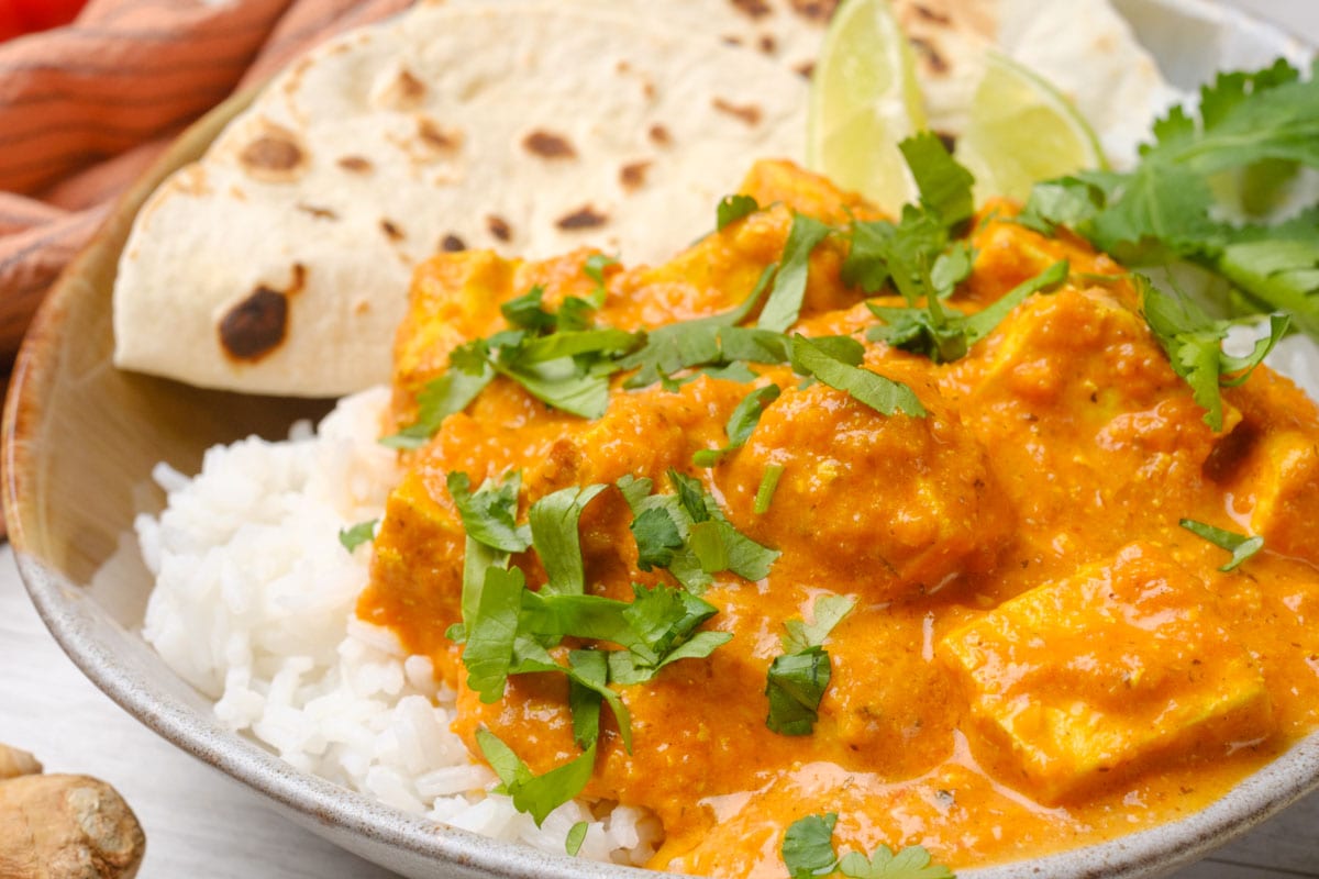 Vegetarian Tikka Masala with Tofu garnished with cilantro