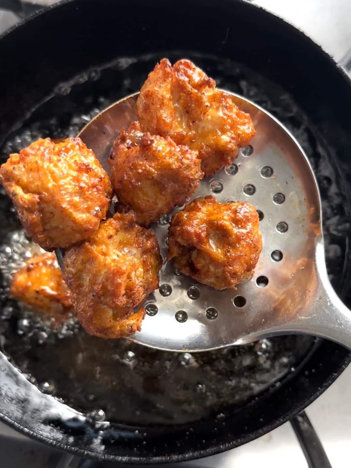 Fried Chicken 65 in a ladle