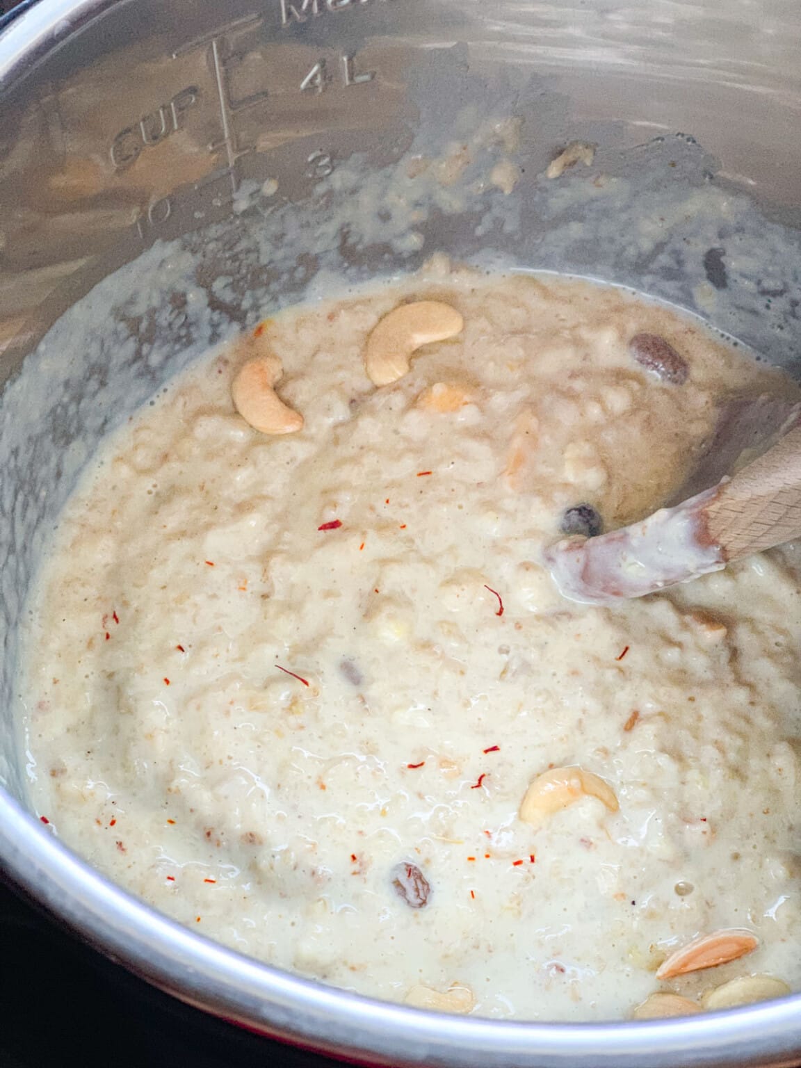 Oats Kheer (Sweetened Oatmeal with Cardamom, Nuts & Raisins) Piping