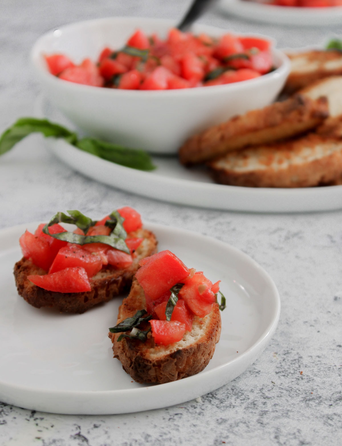 Toasted French bread topped with Bruschetta Dip