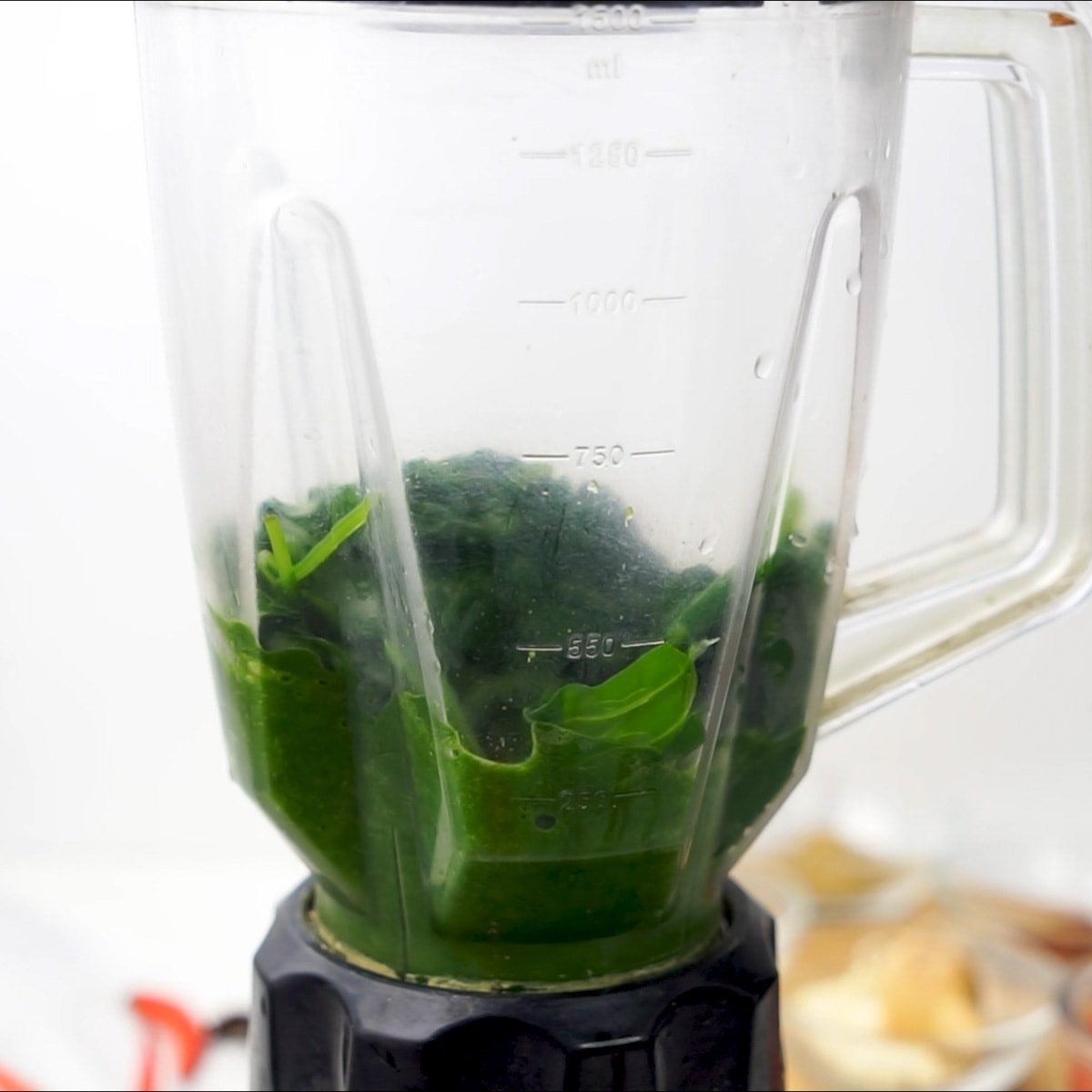 Blend spinach to a puree to make saag.
