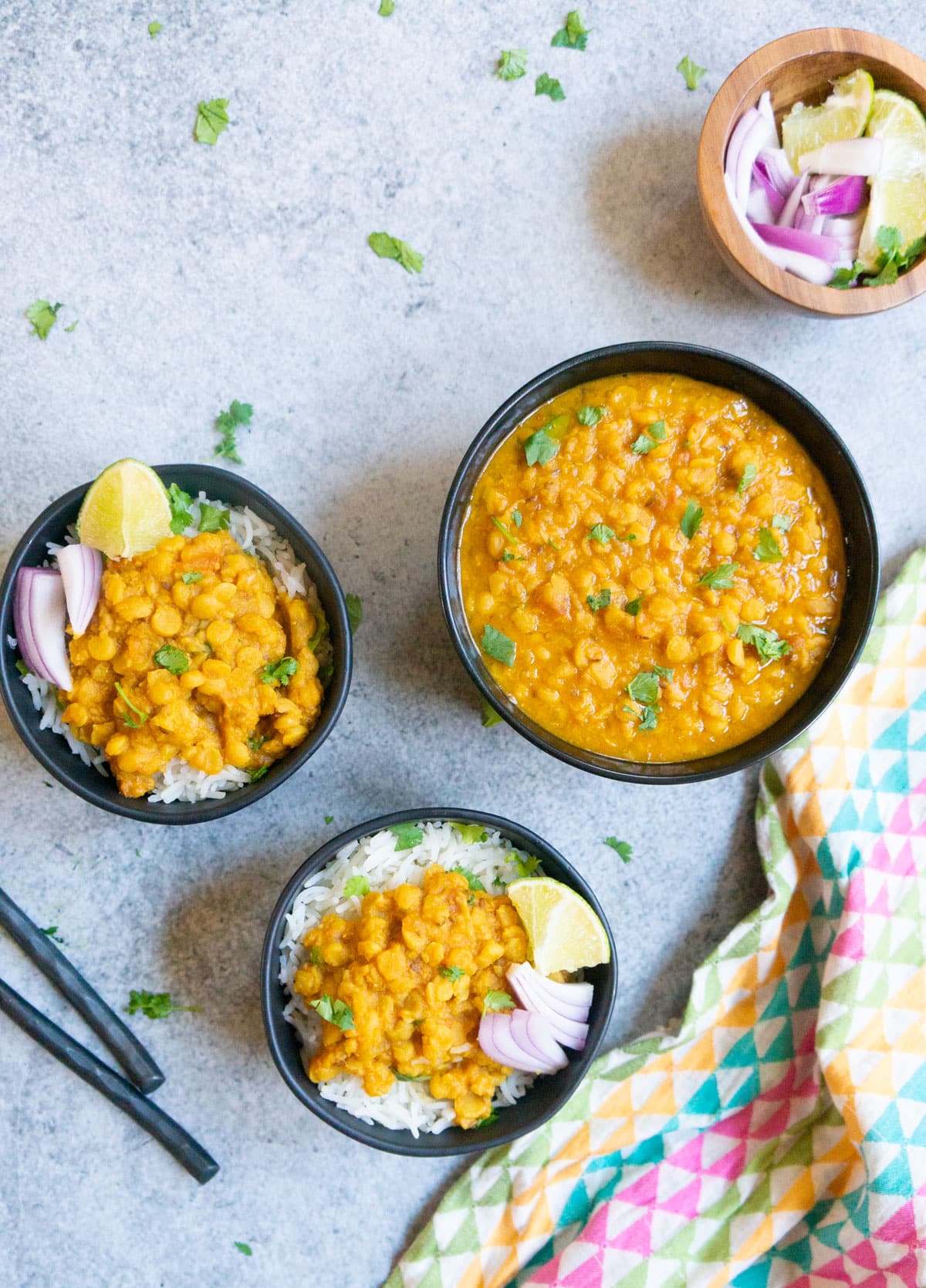 Chana Dal made in the instant pot served in bowls over rice.