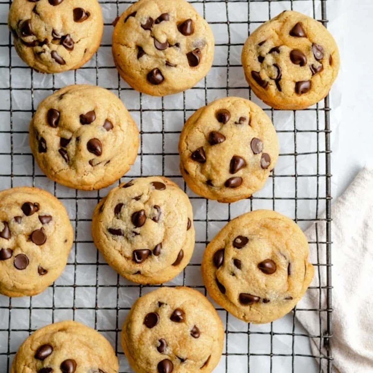 chickpea flour chocolate chip cookies on a wire rack