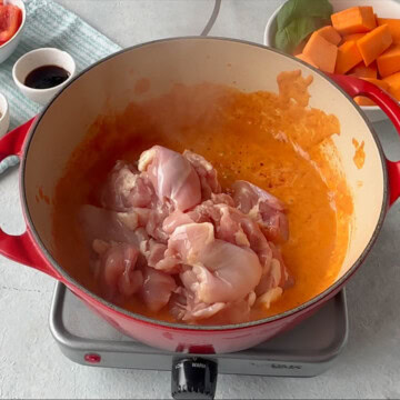 Chicken Thighs added to fry pan, added over to the curry.