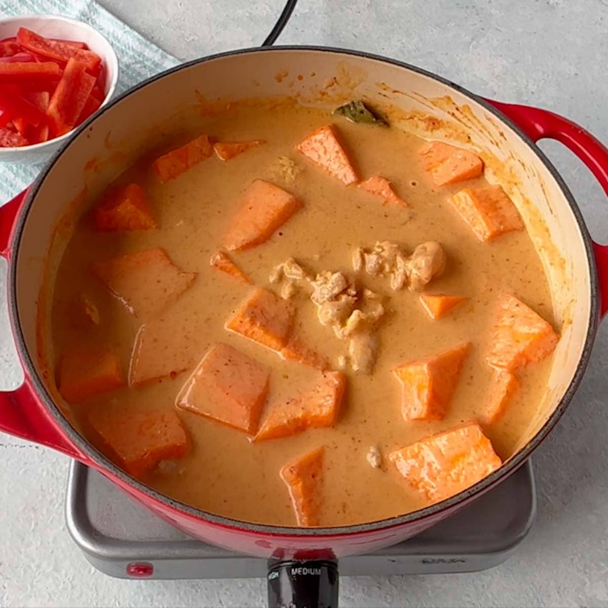 Pumpkin Chicken Curry getting getting cook at medium heat.