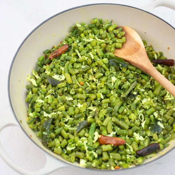 beans poriyal in a white pan