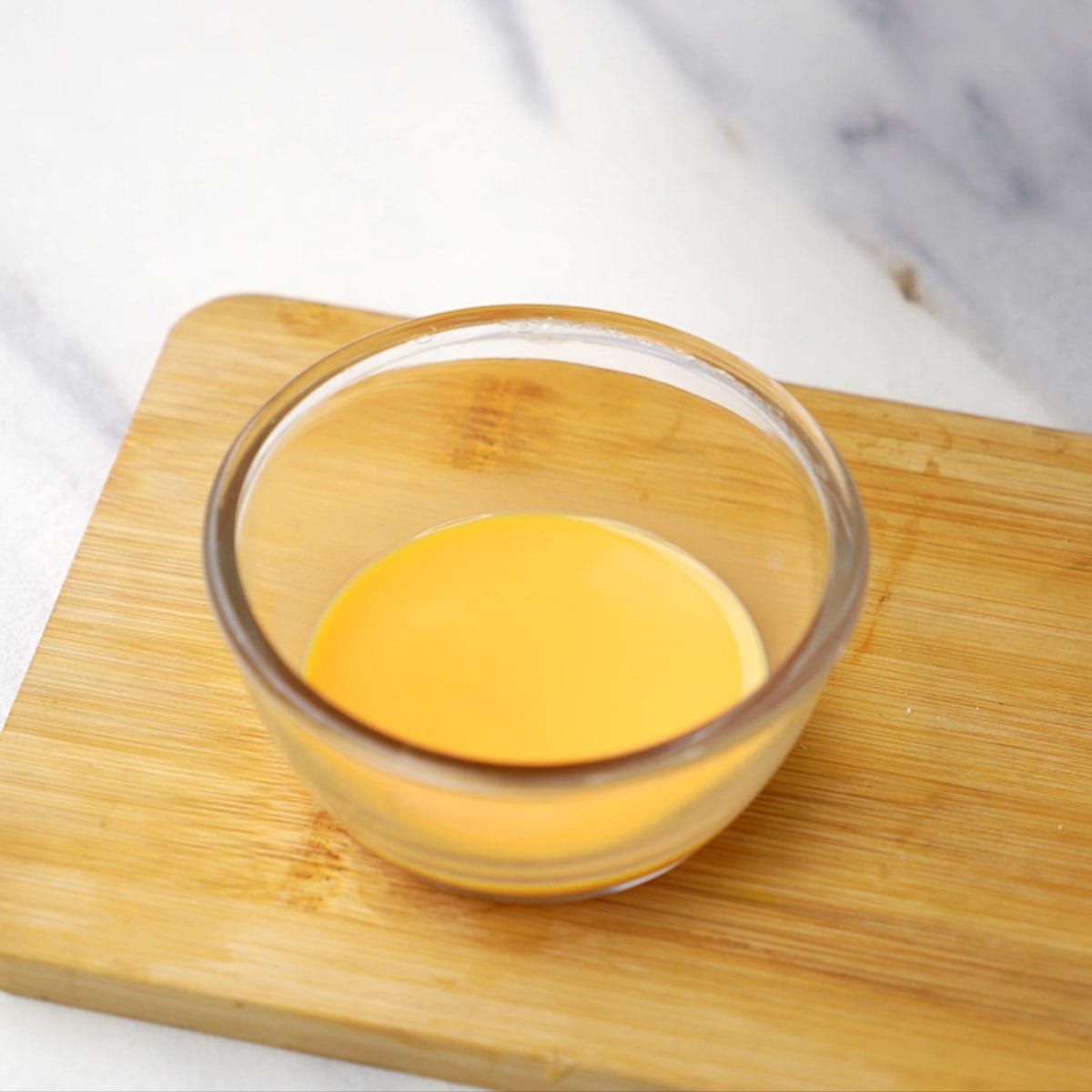Ready saffron milk in a glass bowl