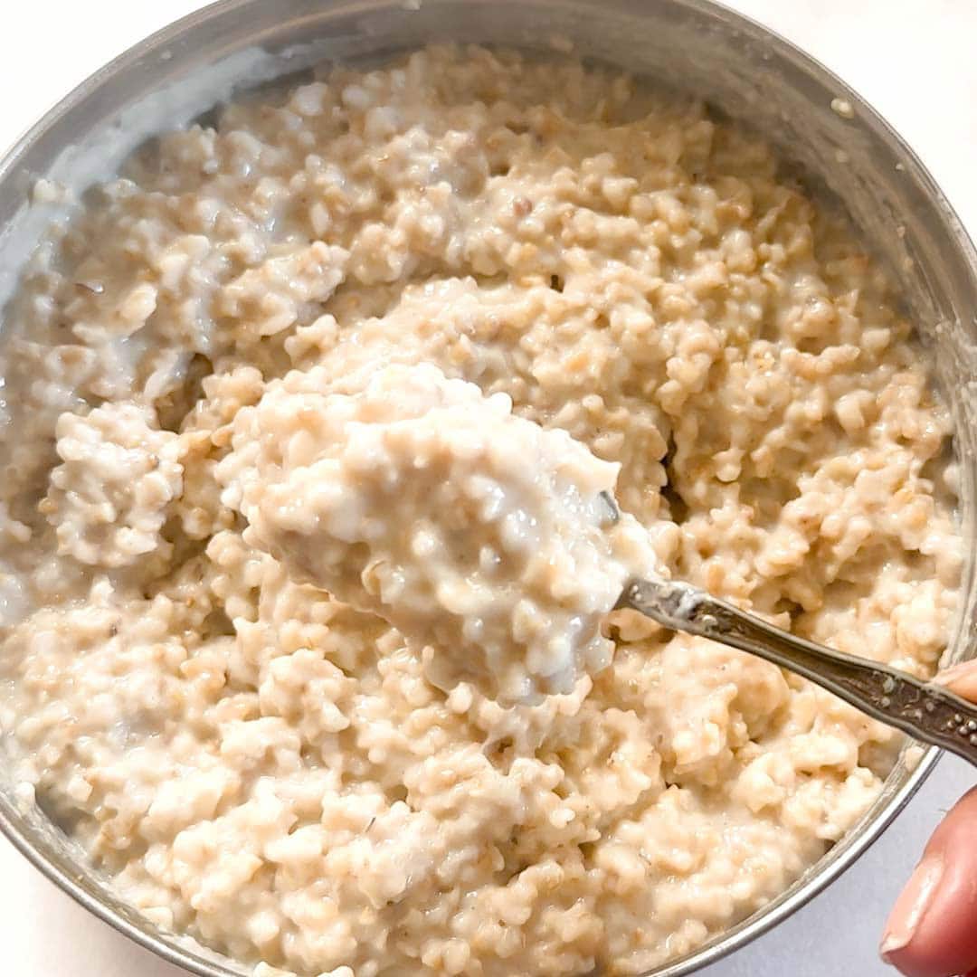 cooked oats in a spoon
