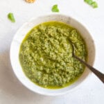 close up shot of Basil Walnut Pesto in a bowl