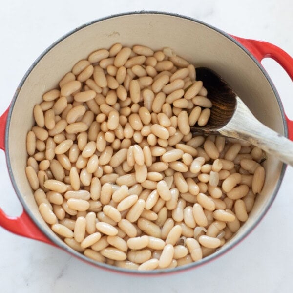 Stovetop Cooked white beans in a dutch oven.