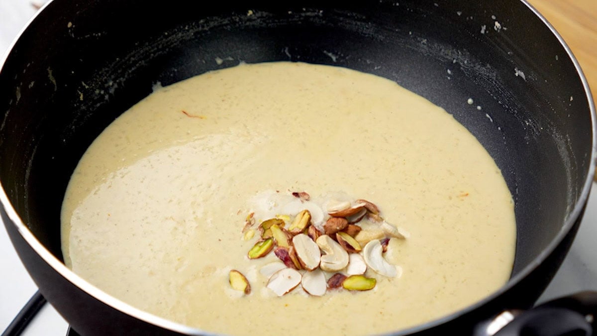 Add the nuts to the rice kheer and mix well