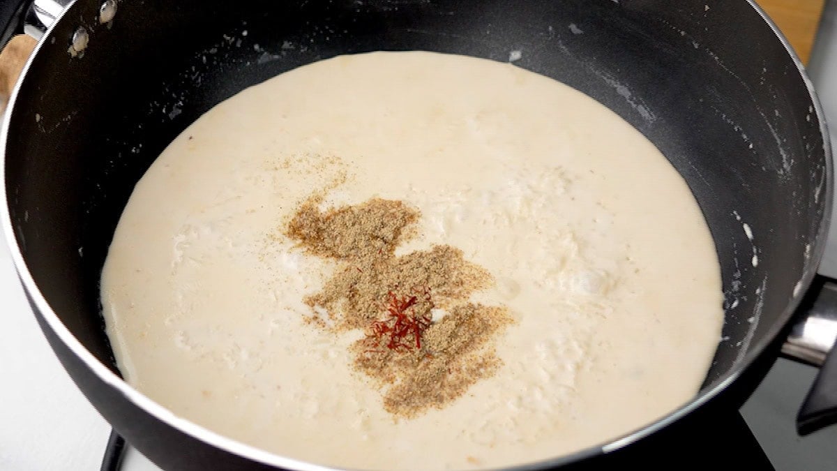 Add in the spices like cardamom powder, saffron to make Rice Kheer