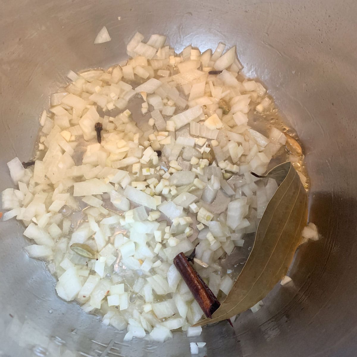 Rice pilaf - Add diced onions and garlic, and sauté until lightly golden.