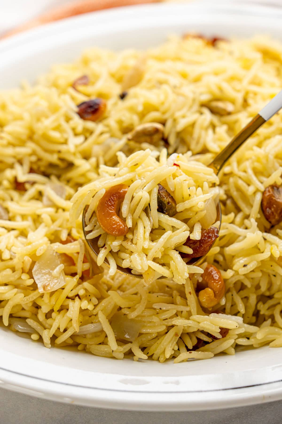 delicious saffron rice in a spoon