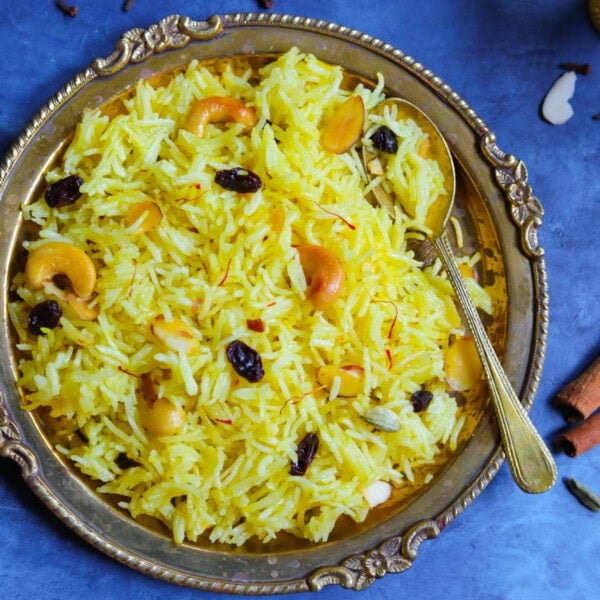 close up shot of zarda sweet rice in a bronze plate