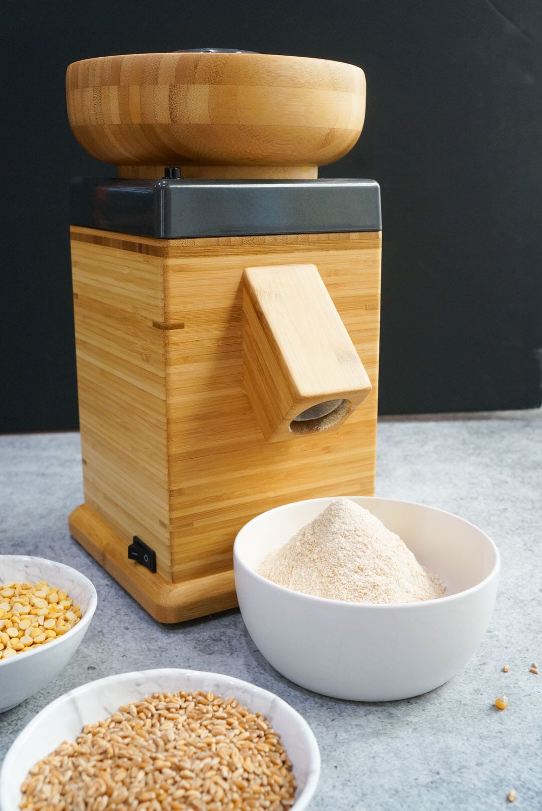 freshly milled flour in a white bowl using nutrimill