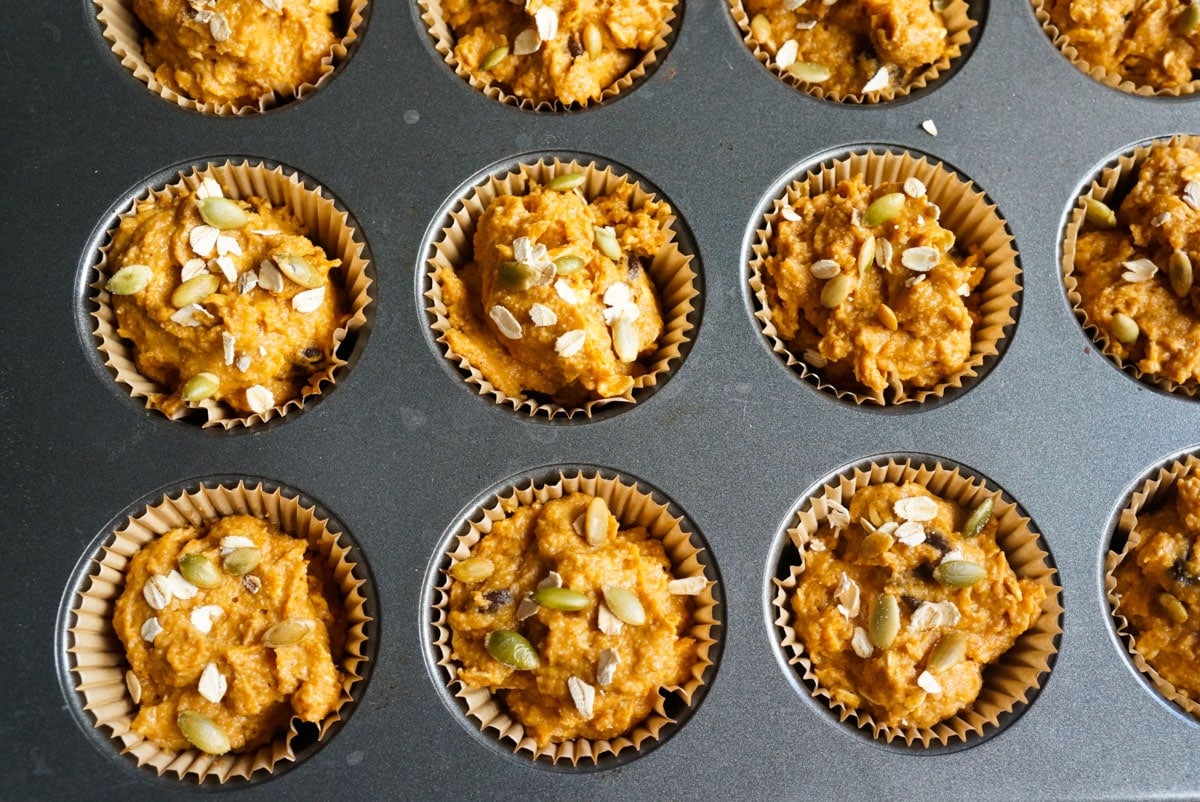 ready to bake Pumpkin Oatmeal Muffins in a muffin molder