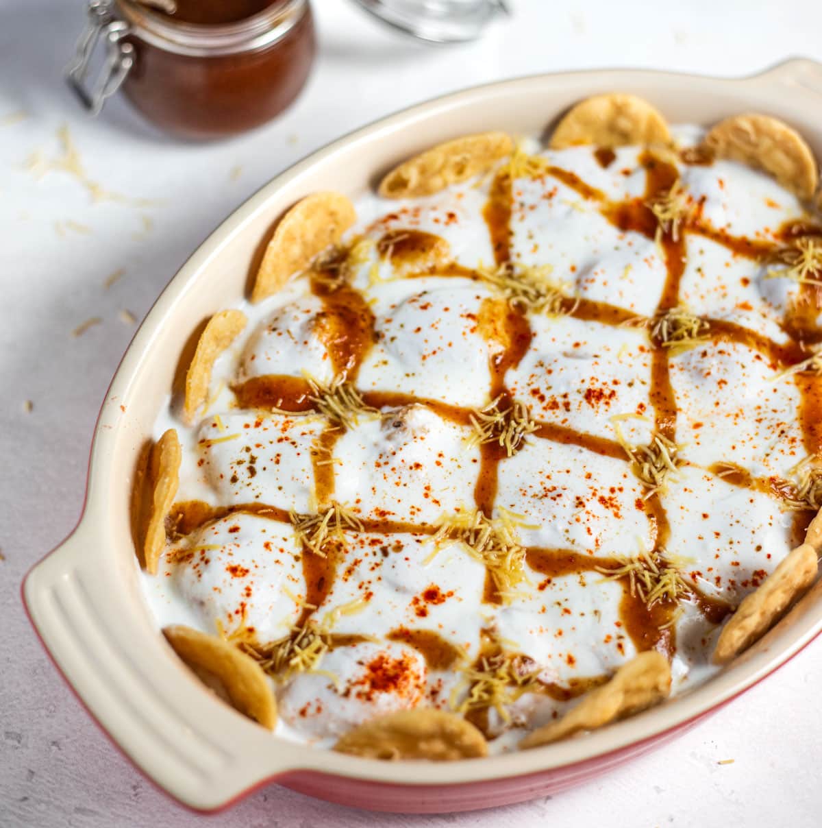 dahi bhalla in a serving bowl