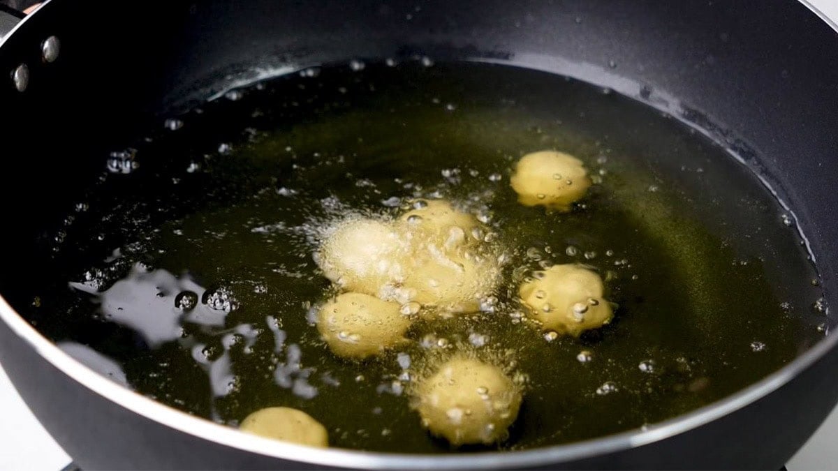 fry gulab jamun until golden brown