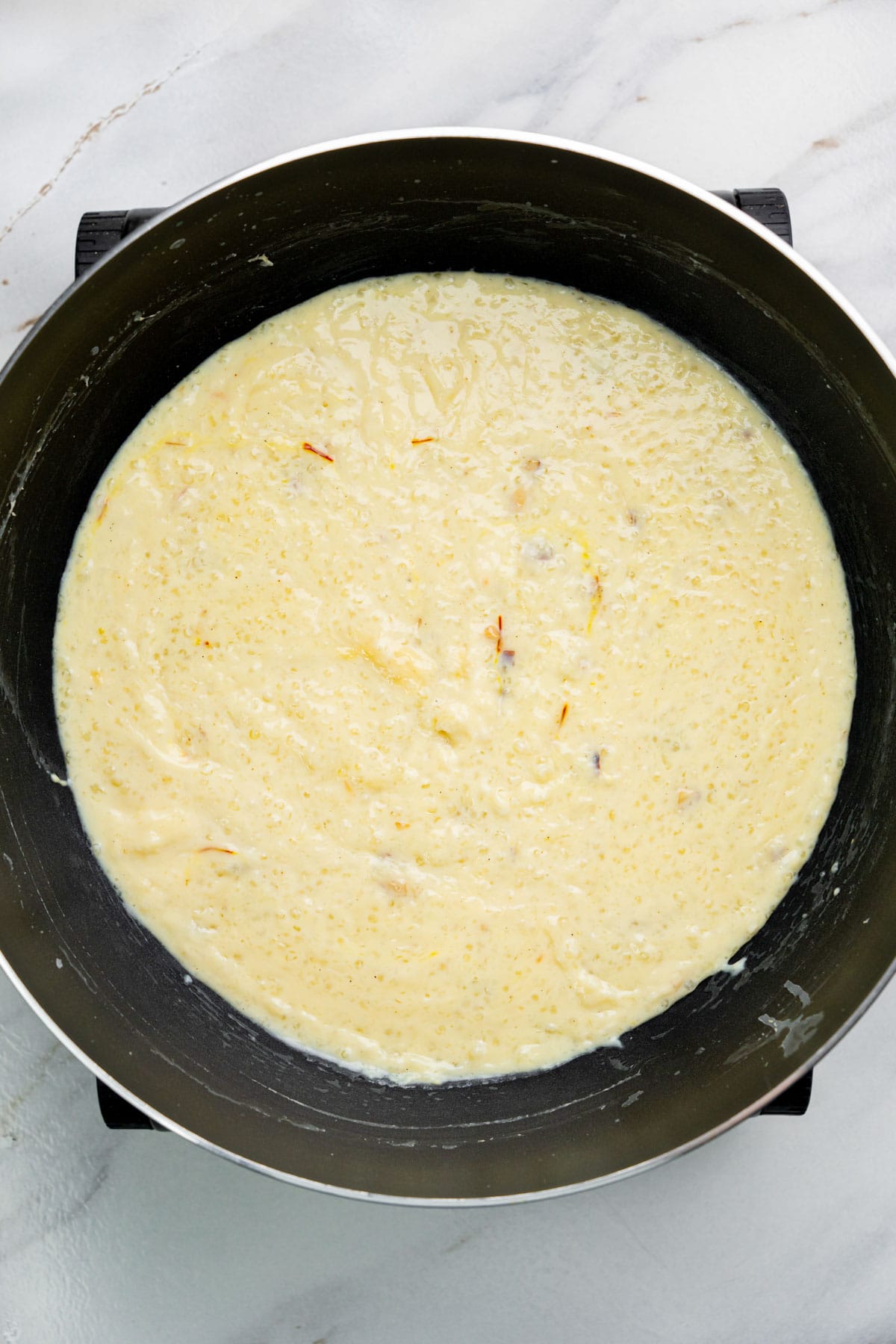 Sabudana kheer cooked in a pan