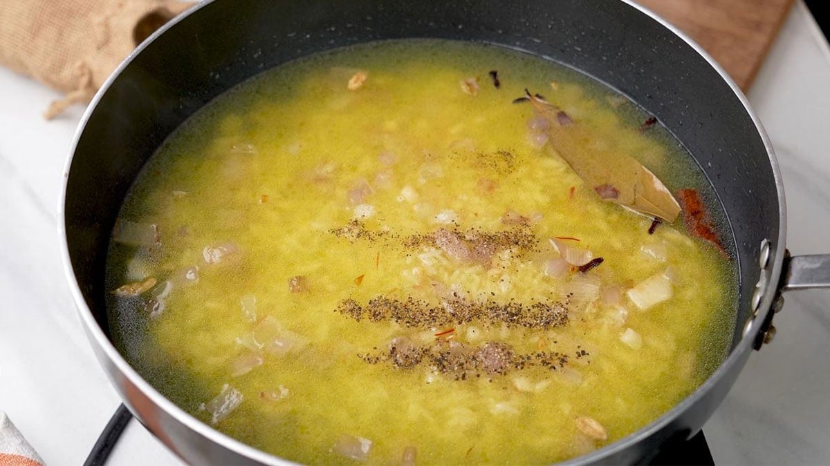 All ingredients added to pan to make saffron rice 