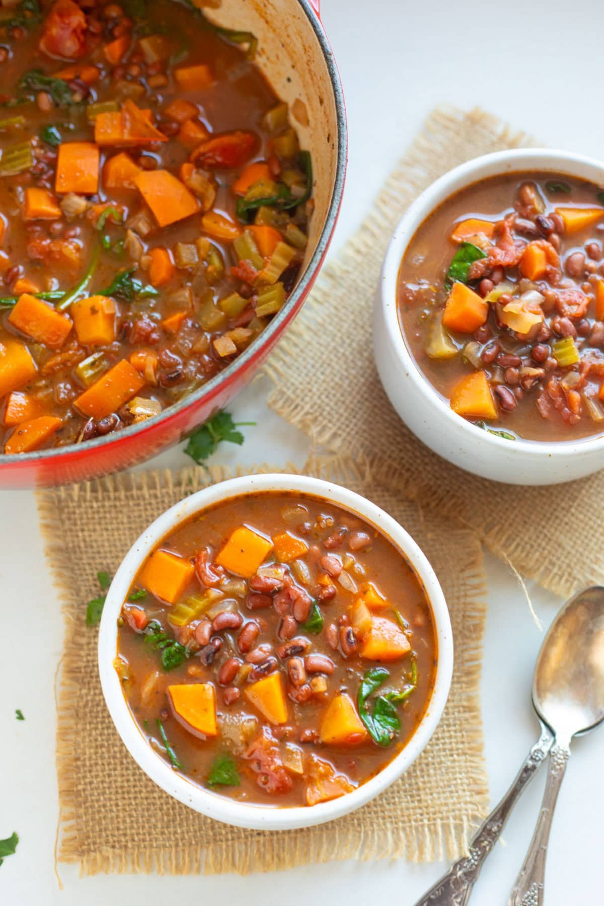 adzuki bean soup in a small white bowl and in a pot ready to serve