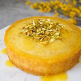 close up shot of whole semolina cake in a cake stand