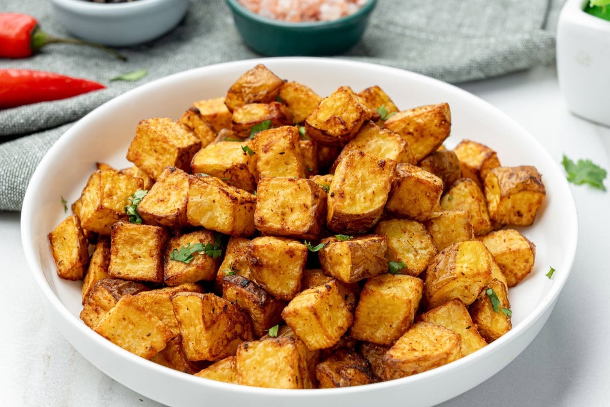 air fried diced potato in a bowl ready to serve