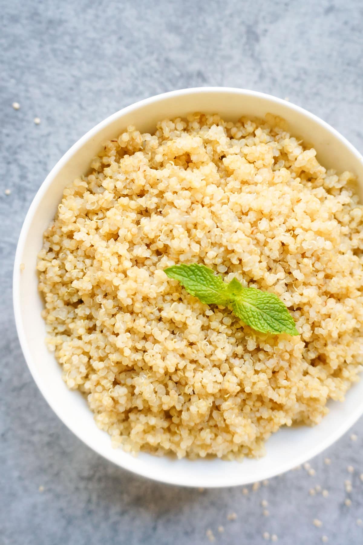Reay to serve quinoa in a white bowl