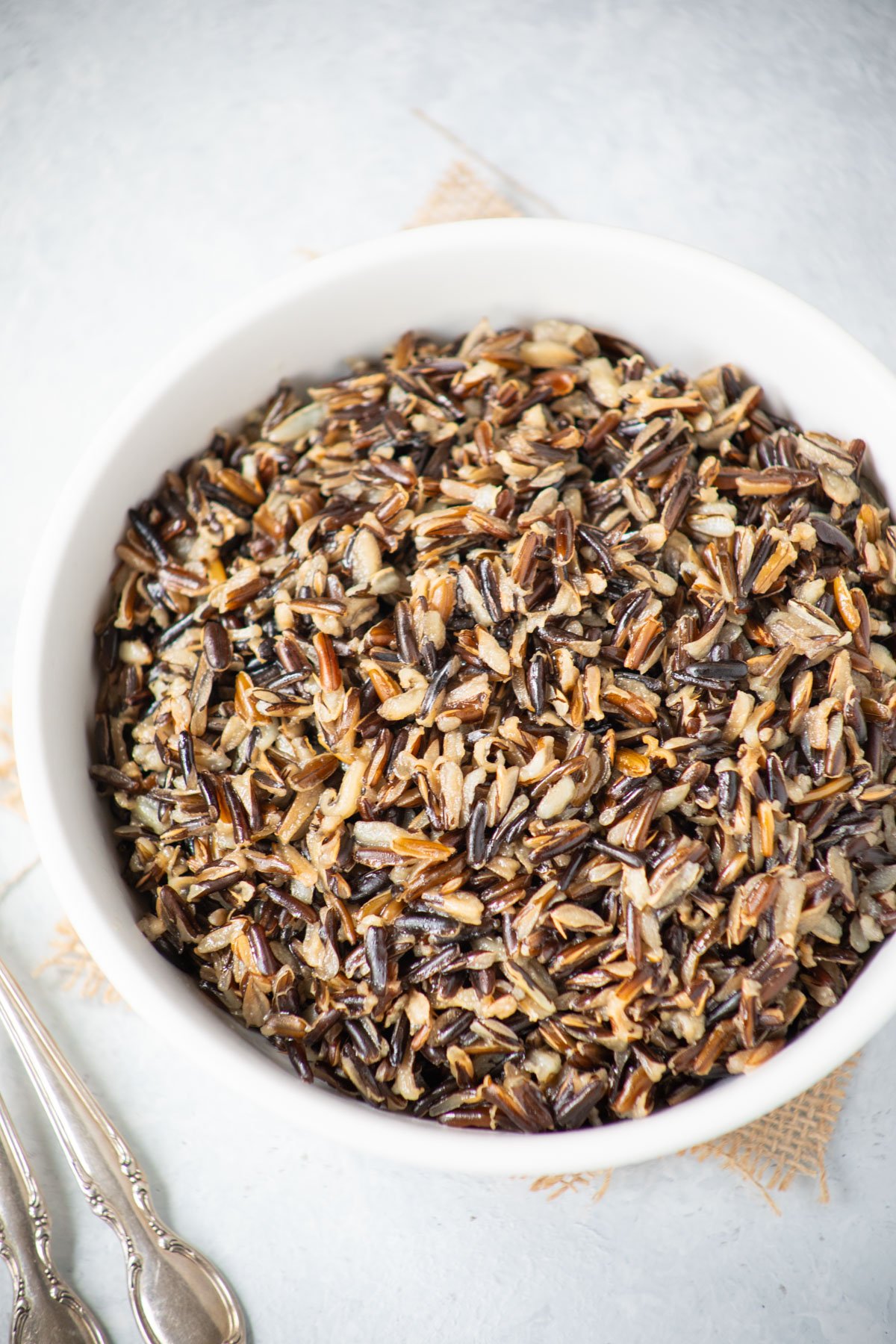 Perfectly cooked wild rice in a white bowl
