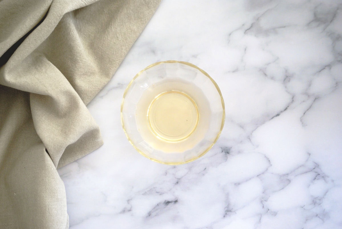 Rice vinegar in a cup for sushi rice