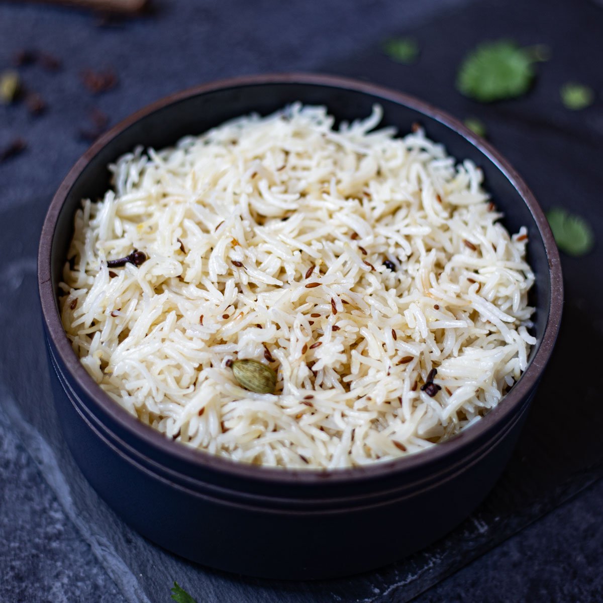 ready to serve jeera rice in a bowl cooked in instant pot