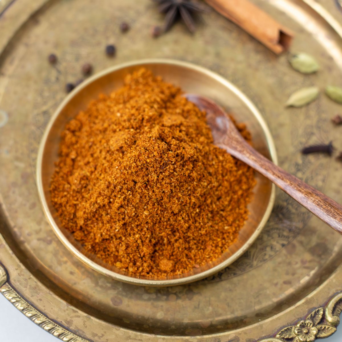 closeup shot of Chettinad Masala in a brass bowl