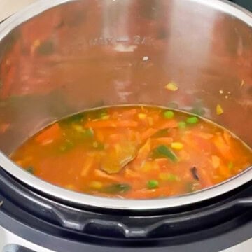 add water and pressure cook to cook dalia pulao
