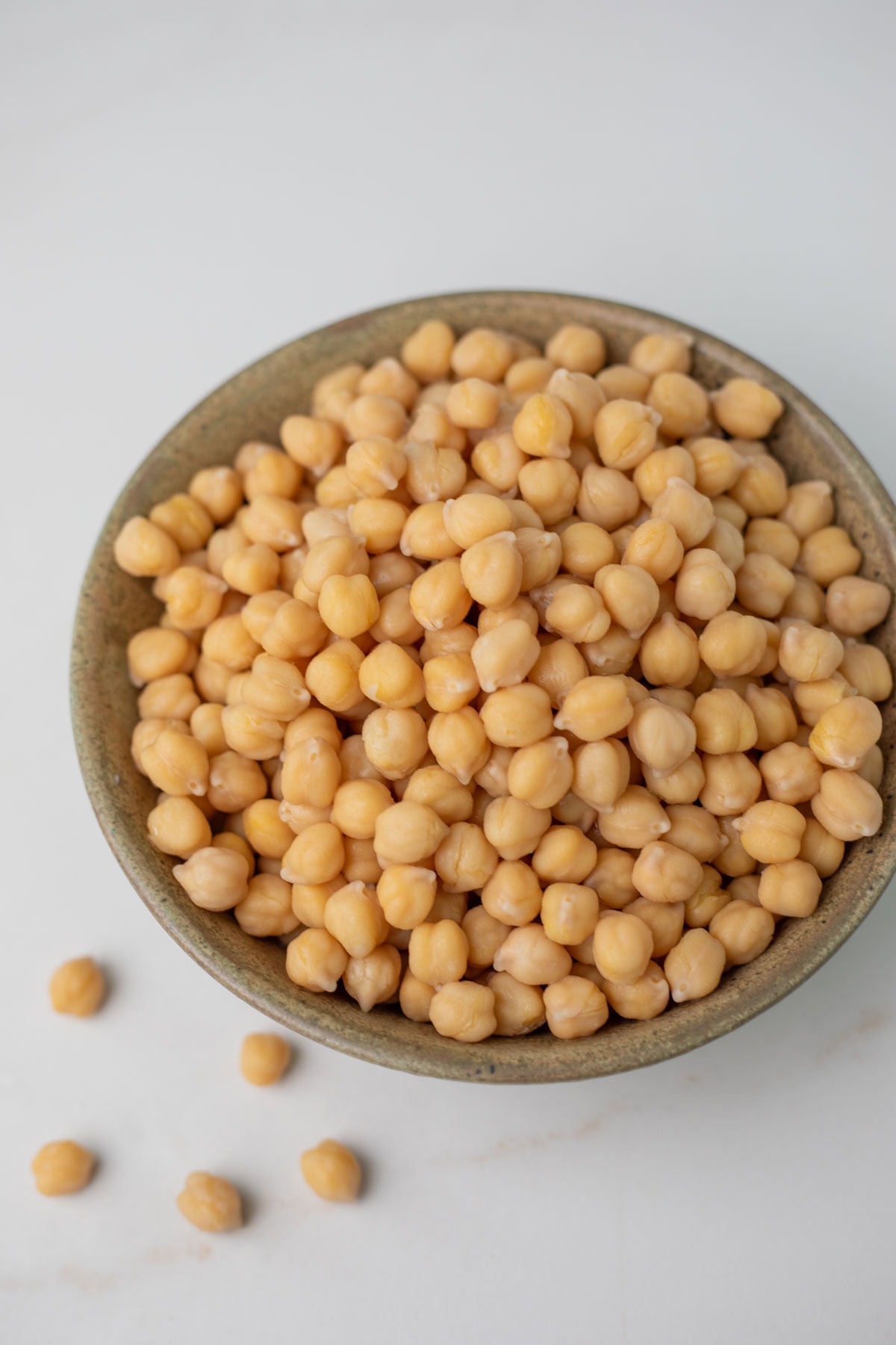 Unsoaked chickpeas cooked perfect in the instant pot served in a bowl.