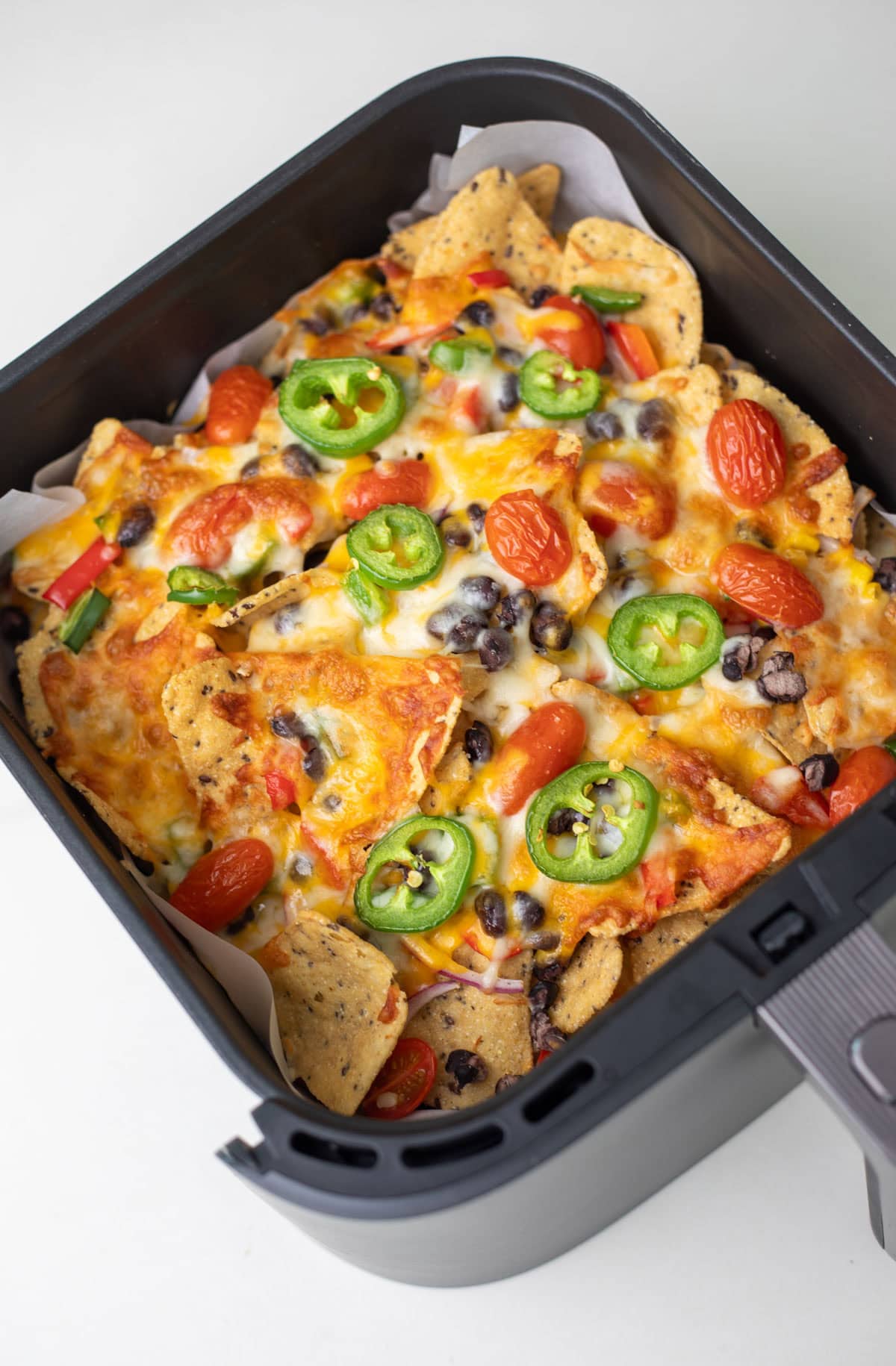 closeup shot of nacho in air fryer basket