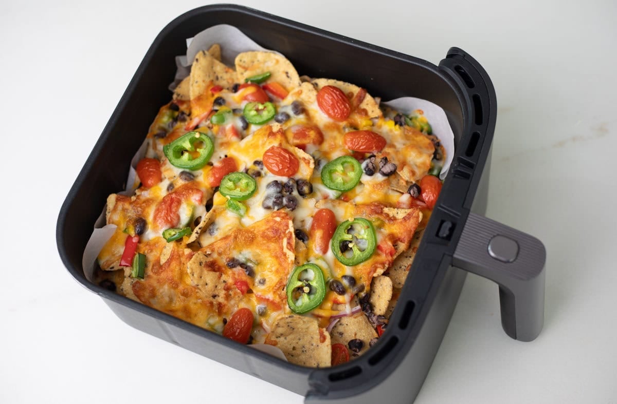 air fried nachos in an air fryer basket