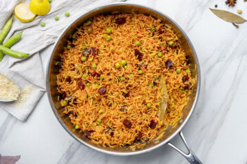 beetroot rice cooked in a pan