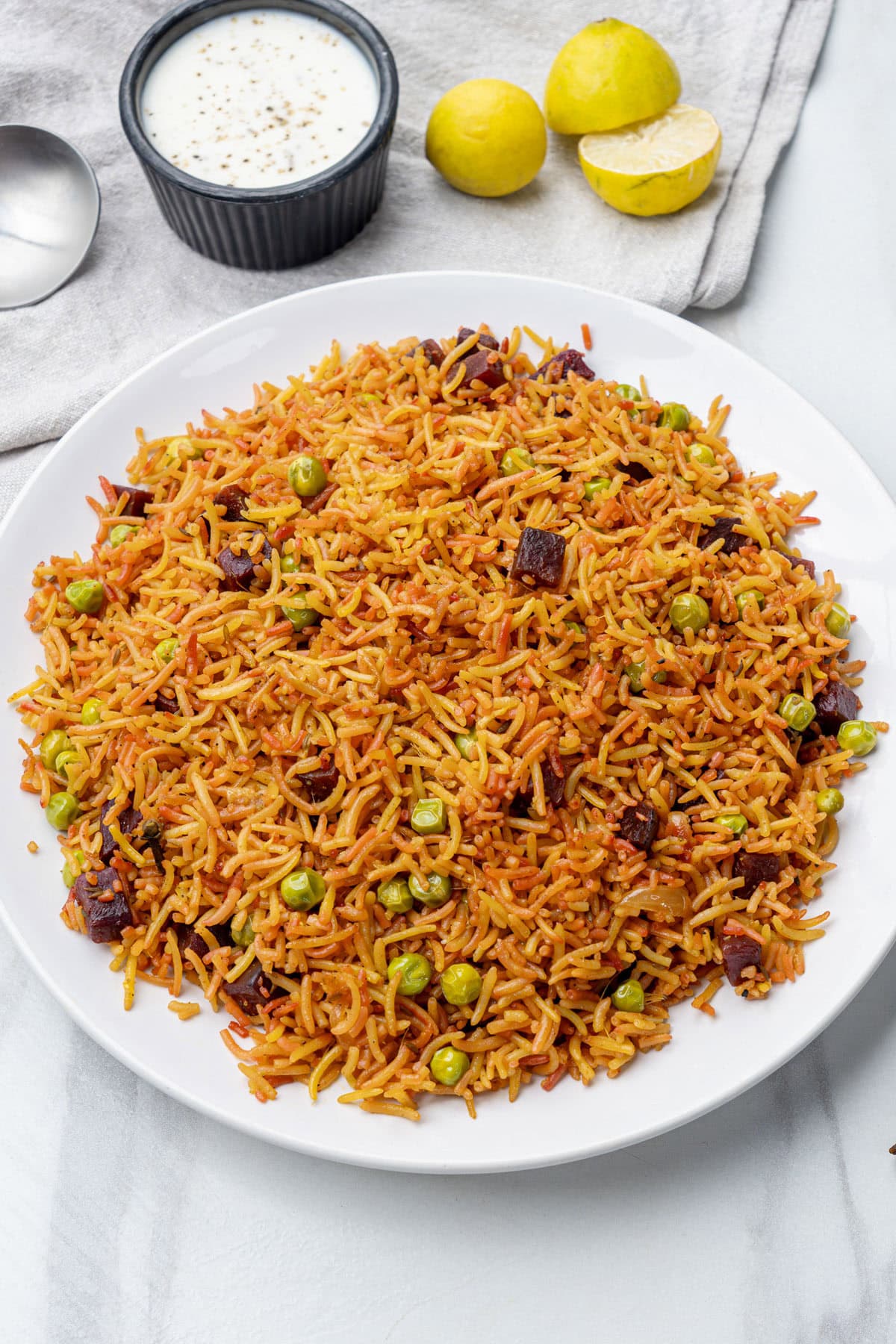 ready to eat beetroot rice on a white plate