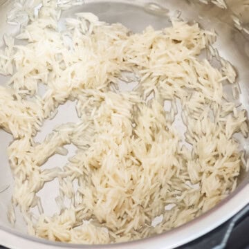 add washed rice into the instant pot to make kheer