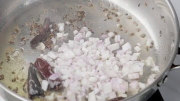 saute onion in the pot to cook masoor dal